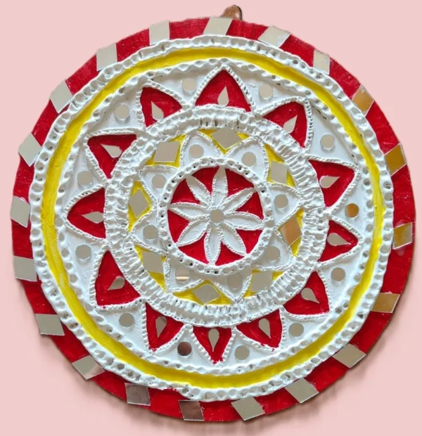 lippan art with red and yellow hues.